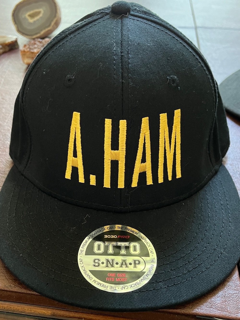 Hamilton Black Snapback Hat with Yellow A.HAM Embroidery